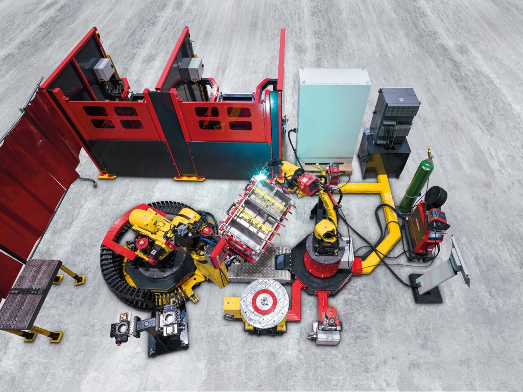 Die modularen Handling-to-Welding-Roboterzelle besteht aus folgenden Komponenten: SchweiÃroboter, Handling-Roboter, Robotersteuerung, Systemsteuerung, Schutzeinhausung und Bauteilschleusen. (Bild: Fronius Deutschland GmbH)